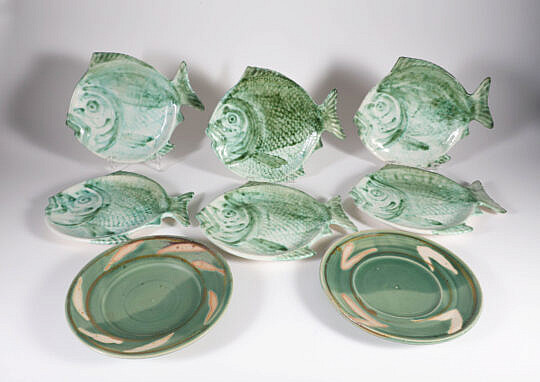 Six Ceramic Folk Art Fish Form Luncheon Plates and Two Round Serving Dishes