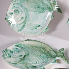 Six Ceramic Folk Art Fish Form Luncheon Plates and Two Round Serving Dishes