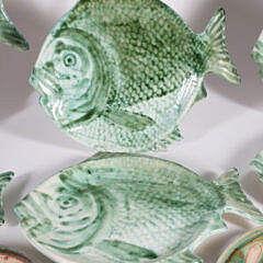 Six Ceramic Folk Art Fish Form Luncheon Plates and Two Round Serving Dishes