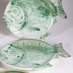 Six Ceramic Folk Art Fish Form Luncheon Plates and Two Round Serving Dishes