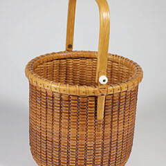 Jean M. Valerio Woven Deep Round Swing Handle Nantucket Basket, circa 1985