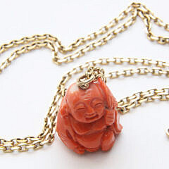 Gump’s Coral Buddha Pendant on 14k Gold Chain