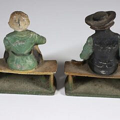 Pair of Antique Cast Iron and Polychrome Bookends Depicting Shaker Man and Woman