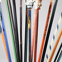 Collection of 16 Assorted Porcelain and Wood Carnival Walking Sticks