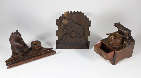 Group of Three Vintage Carved Black Forest Items including: inkwell and pen tray wall pocket music box smoke stand wall pocket