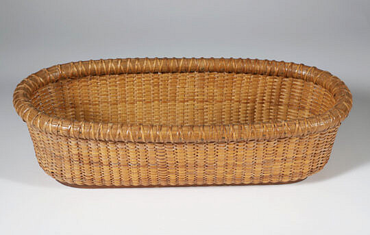 Charles Maguire Woven Nantucket Bread Basket, signed upon the base 