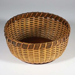 Irving Burnside Open Round Shallow Nantucket Basket, impressed on the base with whale and IHB Nantucket signature 