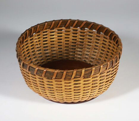 Irving Burnside Open Round Shallow Nantucket Basket, impressed on the base with whale and IHB Nantucket signature 