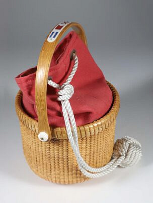 Jean M. Valerio Woven Round Swing Handle Nantucket Basket, Circa 2016, fitted with Nantucket red canvas bag with sailor