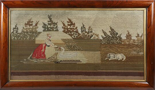 Large English Needlework, 19th Century, depicting a woman feeding a sawn with dog in a landscape setting, in rosewood frame with gilt liner