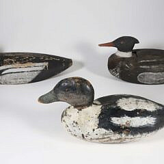Three Antique American Folk Art Duck Decoys including two mergansers and one black and white mason