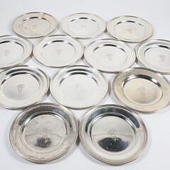 Twelve S. Kirk & Son Inc. Sterling Silver Bread Plates, Baltimore Circa 1925-1932, line molded rim, engraved with monogram MHG 35 Troy Ounces 