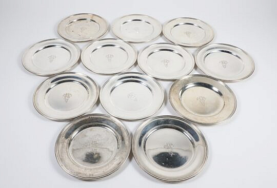 Twelve S. Kirk & Son Inc. Sterling Silver Bread Plates, Baltimore Circa 1925-1932, line molded rim, engraved with monogram MHG 35 Troy Ounces 
