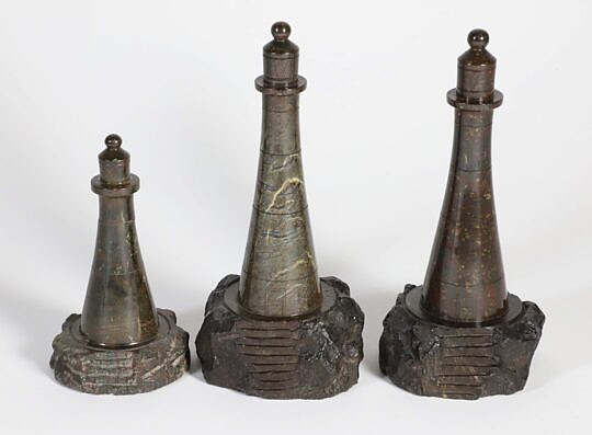 Three Cornish Carved Serpentine Stoneware Stoneware Lighthouse Models, 20th Century made in England; carved from the distinctive red and green stone found on the lizard peninsula, cornish serpentine lighthouses became popular in the mid 19th century.