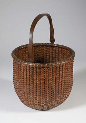 Tall Round Open Swing Handle Nantucket Basket, Early 20th Century, brass ears, carved lollipop handle, incised concentric circles on interior of base