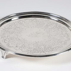 George III Sterling Silver Salver, London, 1805, circular engraved with elaborate wreath centering "D" monogram, on 3 tapered legs 10.6 Troy Ounces 