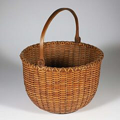 Round Open Swing Handle Nantucket Basket, Late 19th Century, wood ears, carved handle
