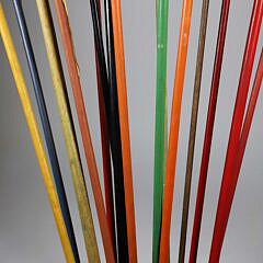 Collection of 16 Assorted Porcelain and Wood Carnival Walking Sticks