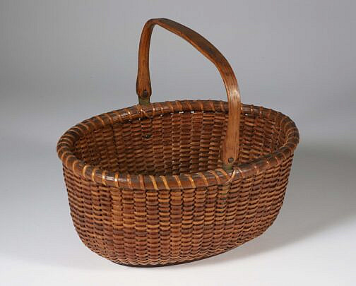 Mitchy Ray Round Open Swing Handle Nantucket Basket, paper label underneath "Lightship Basket made by Mitchell Ray, Nantucket, Mass"