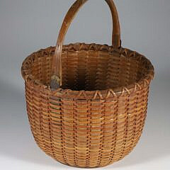 Roland Folger (1803-1883) Round Swing Handle Nantucket Basket, with stenciled signature