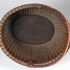 Fine Open Oval Swing Handle Nantucket Basket with Carved Wood Ears, mid 19th Century