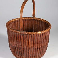 Fine Early Open Round Swing Handle Nantucket Basket, inscribed on base "Lightship basket made by lightship basket keeper, Nantucket, Mass"