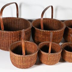 Rare Nest of Ten Jose Formoso Reyes Round Swing Handle Nantucket Baskets