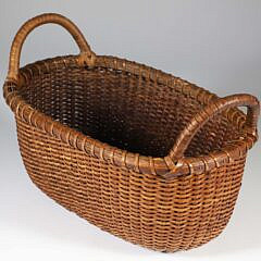 Unusual Vintage Oval Nantucket Basket with Affixed Wrapped Handles