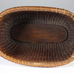 Unusual Vintage Oval Nantucket Basket with Affixed Wrapped Handles