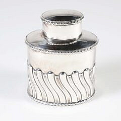 Edwardian Sterling Silver Tea Caddy, Atkin Brothers, Sheffield, 1904, of oval section with wavy fluted sides, gadroon rims