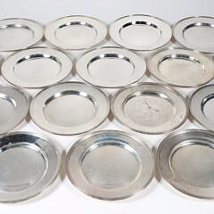 Sixteen Sterling Silver Bread Plates with Line Molded Rims