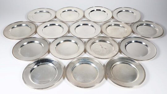 Sixteen Sterling Silver Bread Plates with Line Molded Rims