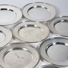 Sixteen Sterling Silver Bread Plates with Line Molded Rims