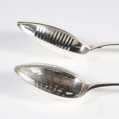 Two Georgian Sterling Silver Strainer Spoons