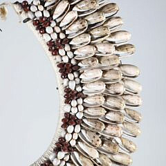 Papua Cowie Shell Bib Necklace on Custom Stand