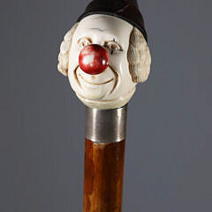 Carved Clown Head Wearing Cap Grip Walking Stick, 19th Century