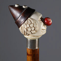 Carved Clown Head Wearing Cap Grip Walking Stick, 19th Century