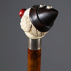 Carved Clown Head Wearing Cap Grip Walking Stick, 19th Century