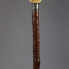 Carved Dog’s Head Emerging From a Ball Walking Stick, 19th Century