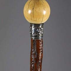 Carved Dog’s Head Emerging From a Ball Walking Stick, 19th Century