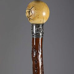 Carved Dog’s Head Emerging From a Ball Walking Stick, 19th Century