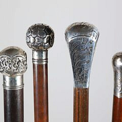 Six Repousse Sterling Silver Knob Grip Walking Sticks, 19th Century