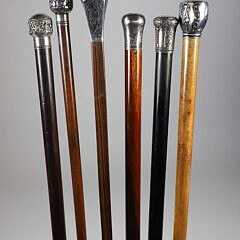 Six Repousse Sterling Silver Knob Grip Walking Sticks, 19th Century