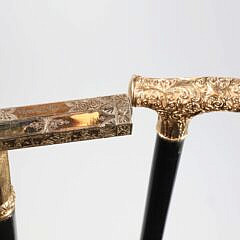 Two Repousse Gold Filled L-Grip Canes, 19th Century