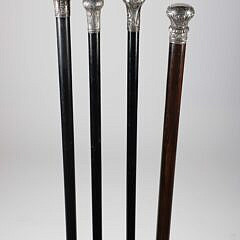 Four Repousse Silver Knob Presentation Walking Sticks, 19th Century