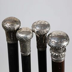 Four Repousse Silver Knob Presentation Walking Sticks, 19th Century