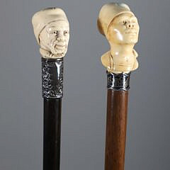 Two Carved Portrait Grip Walking Sticks, 19th Century