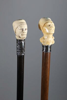 Two Carved Portrait Grip Walking Sticks, 19th Century
