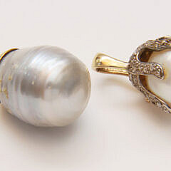Two South Sea Pearl Pendants with Gold Mountings, One with Diamonds