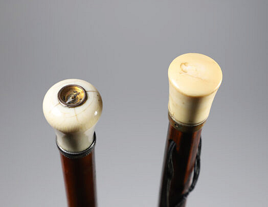 Two Sticks: A Compass Inserted in Grip and Knob Walking Stick on Wood Shafts